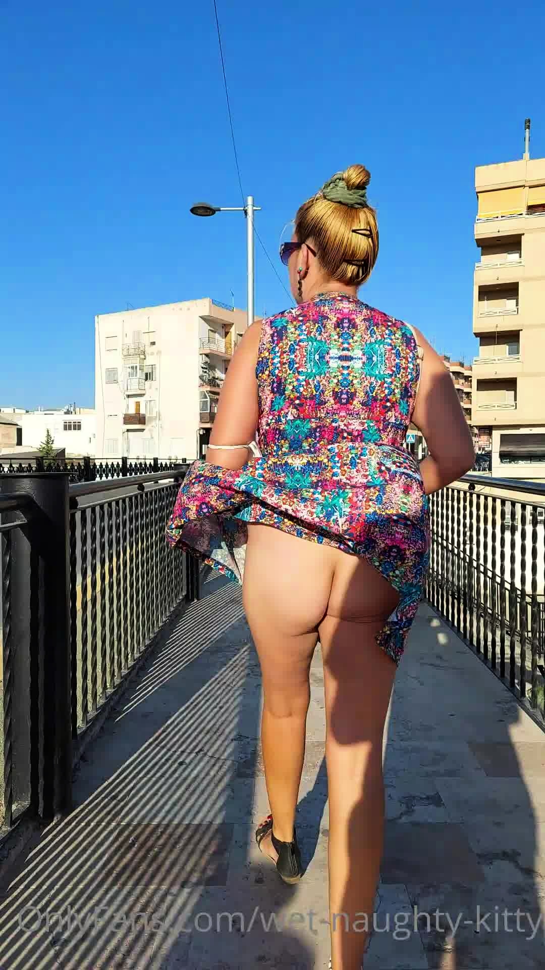 Street Voyeur Follows A Pantyless Milf With A Fabulous Ass Video at Porn image image
